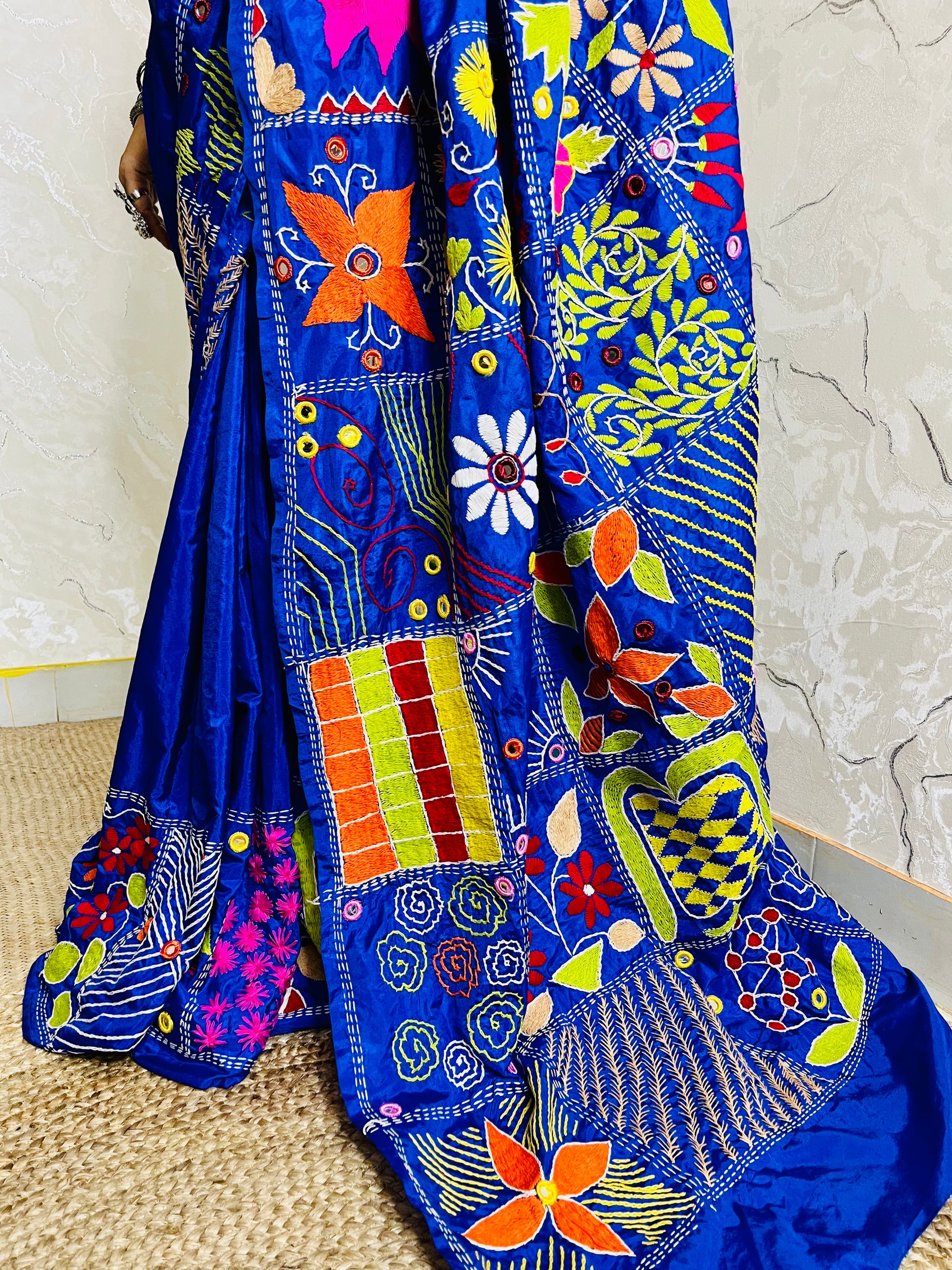 Close up of Lambani embroidery on dark blue Bangalore silk saree