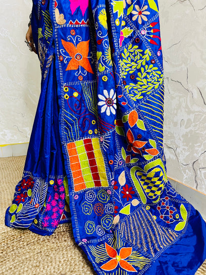 Close up of Lambani embroidery on dark blue Bangalore silk saree