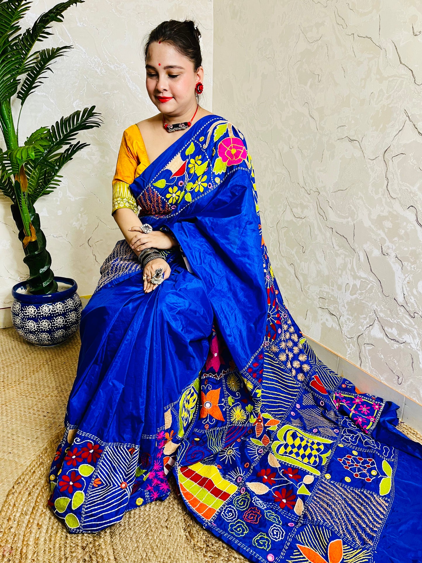 Premium blue silk saree with colourful handcrafted threadwork border