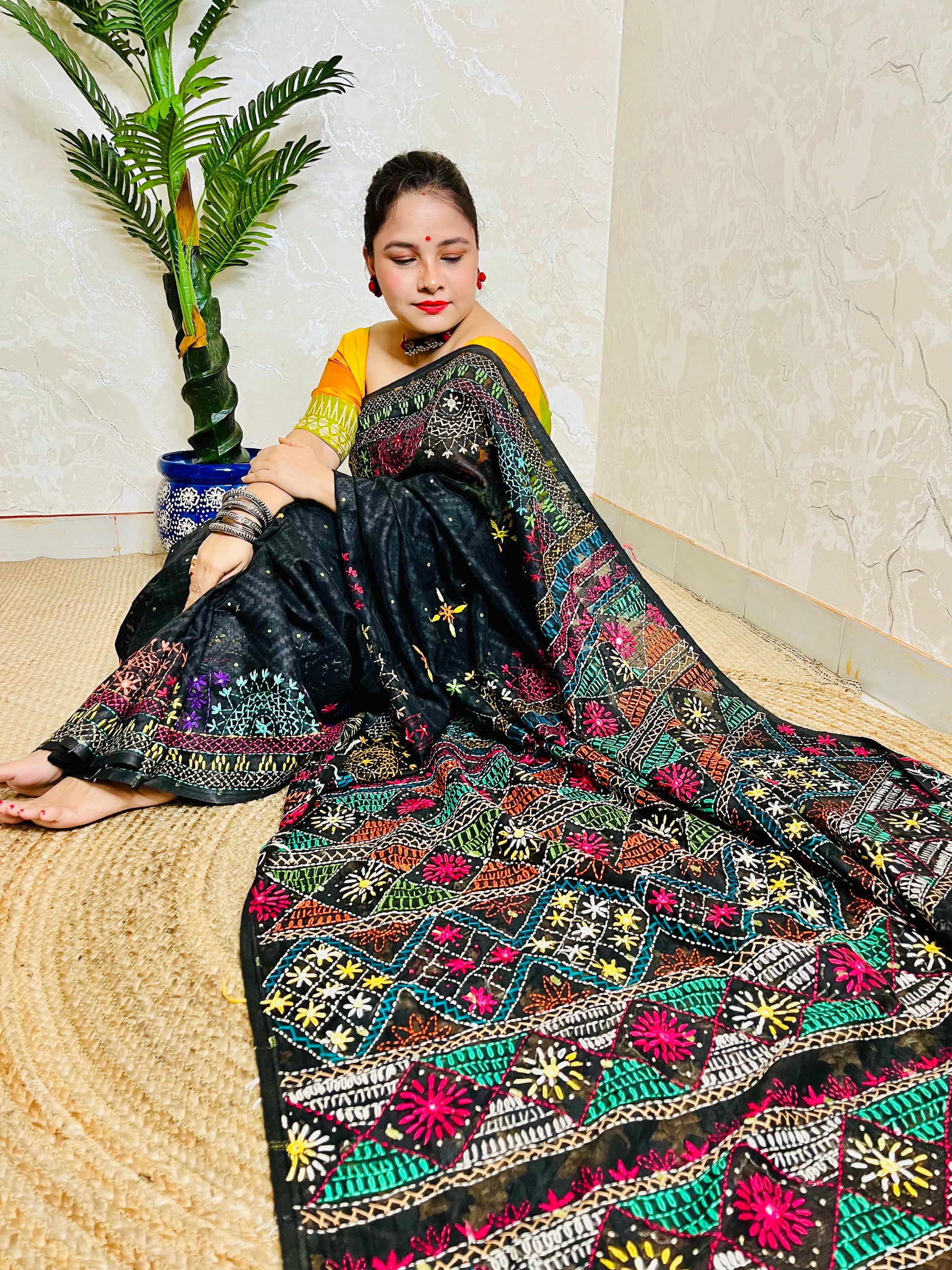 Indian woman styling black embroidered Jamdani saree ethnic look
