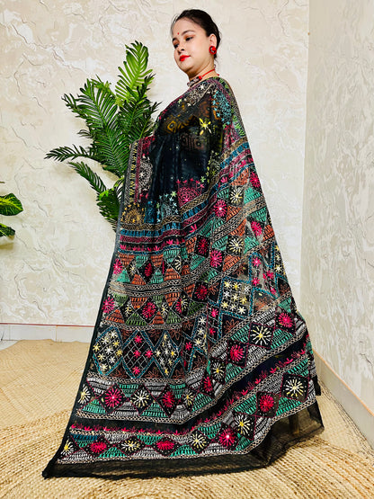 Close up of Lambani embroidery on black cotton Jamdani saree
