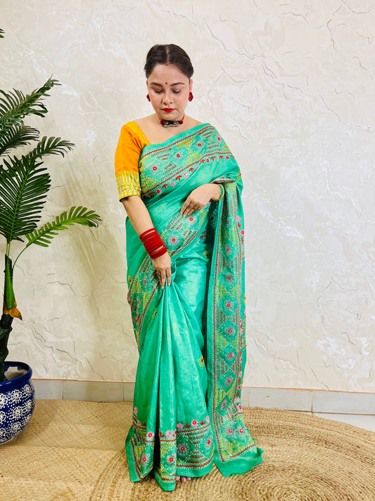 Sea green Lambani handstitched pure tissue silk saree with embroidery design