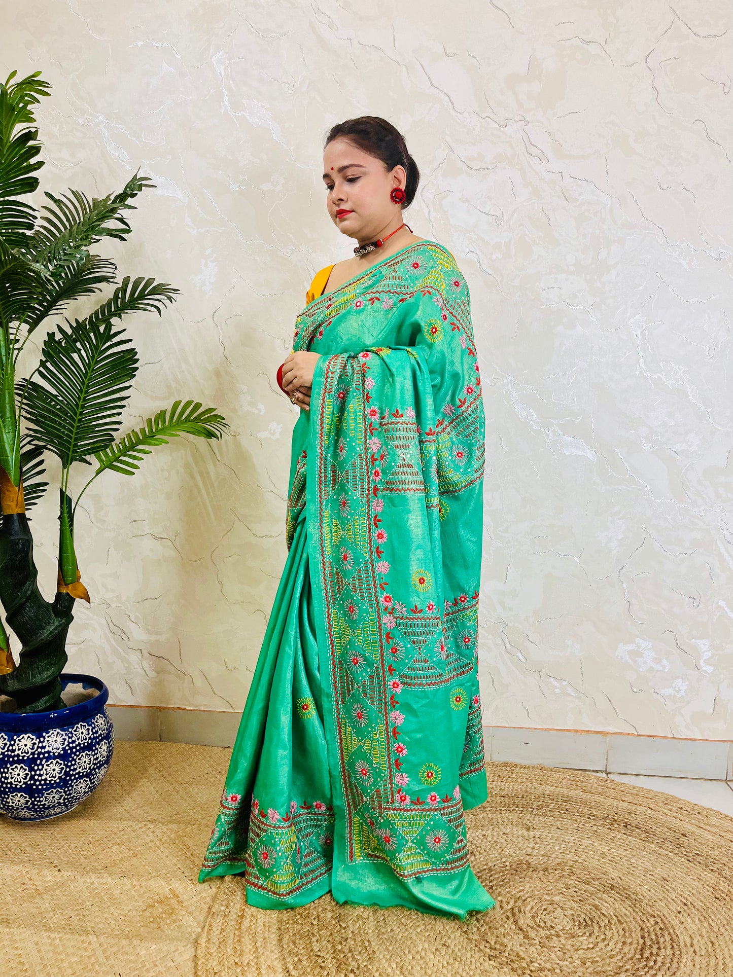 Soft shimmer tissue silk saree sea green with traditional hand embroidery
