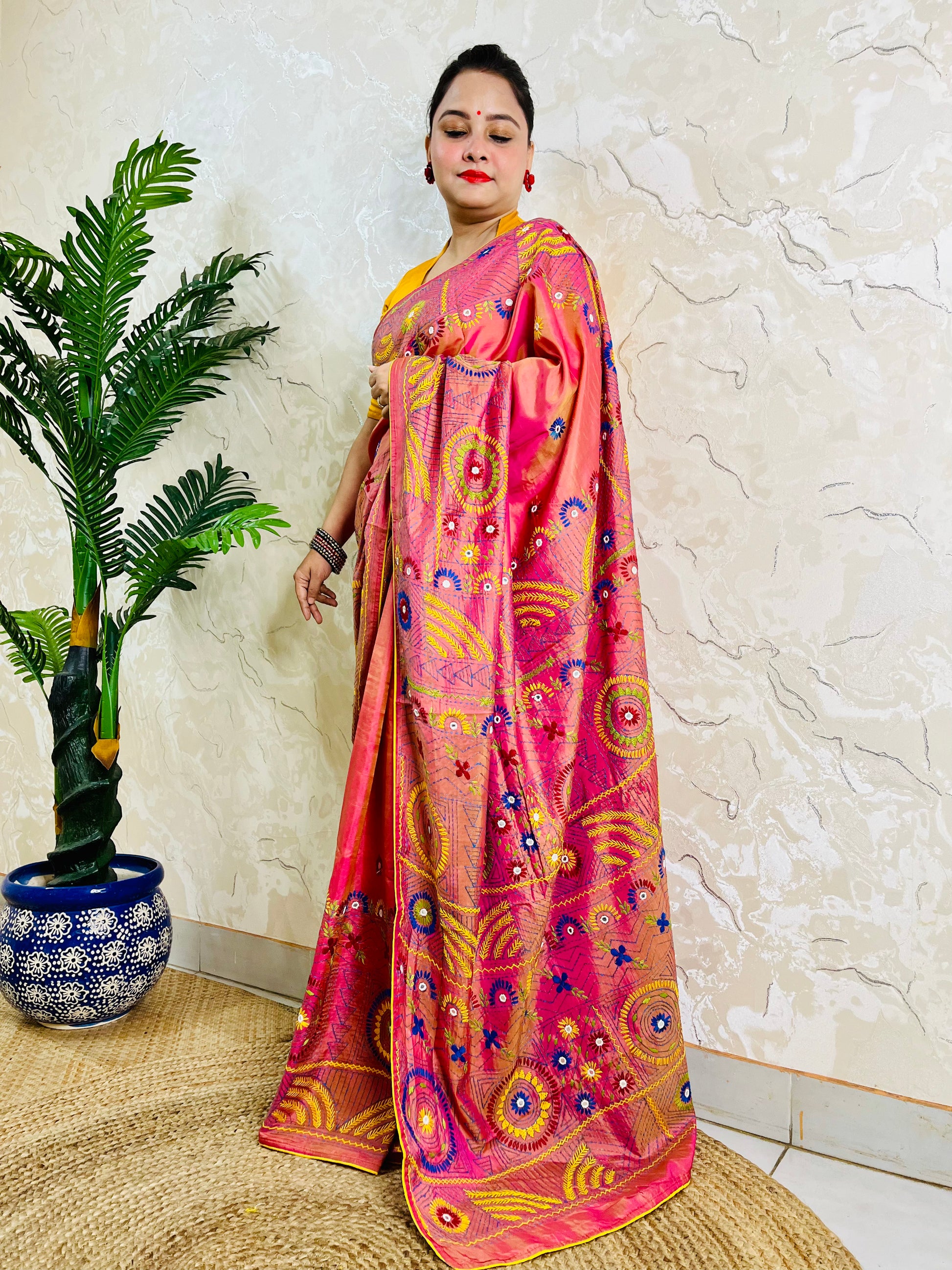 Coral pink Lambani mirror work saree, front standing view