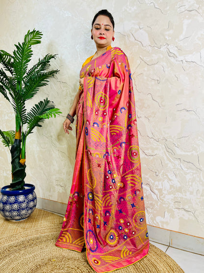 Coral pink Lambani mirror work saree, front standing view