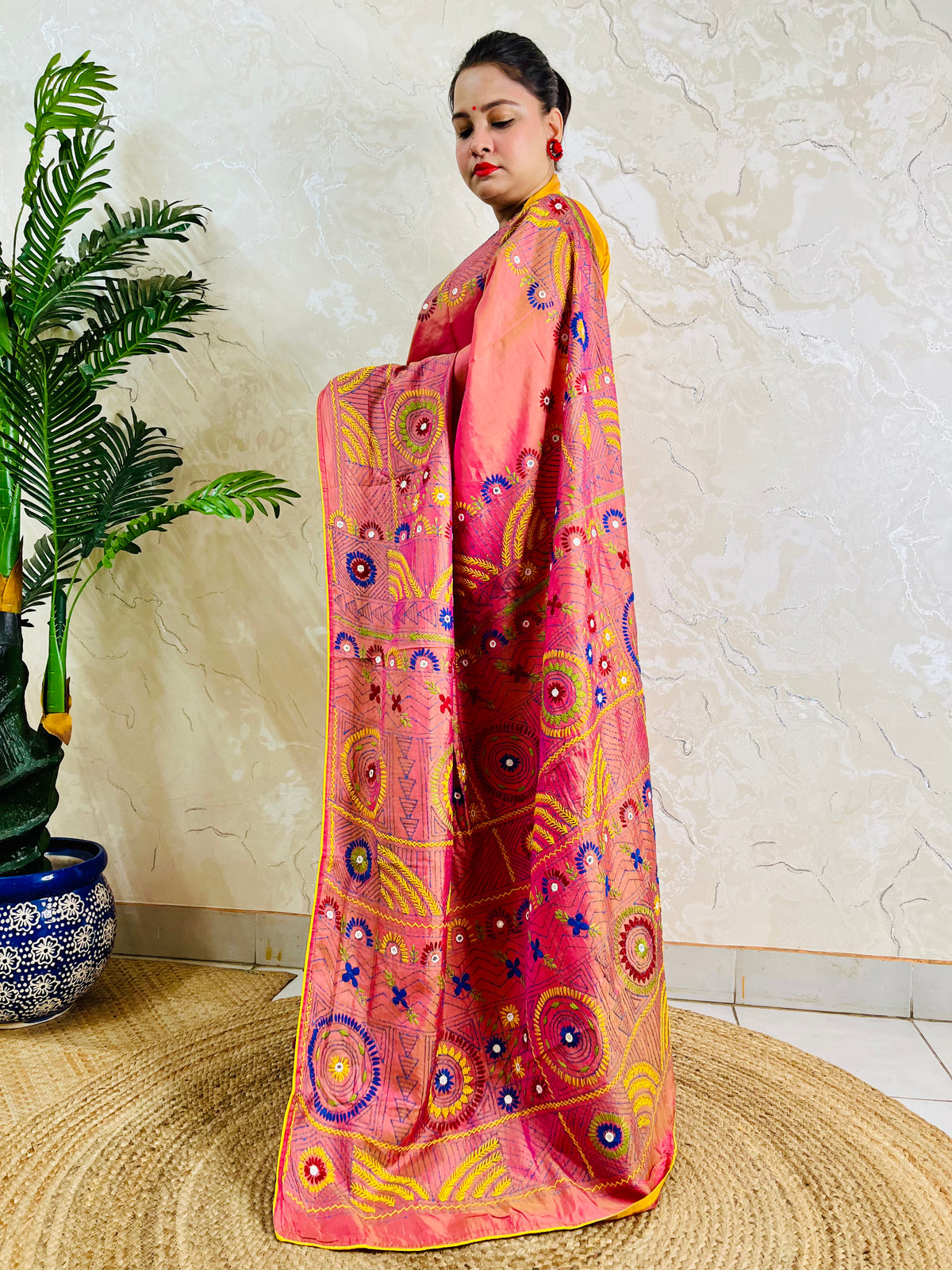 Coral pink Lambani mirror work saree, front standing view