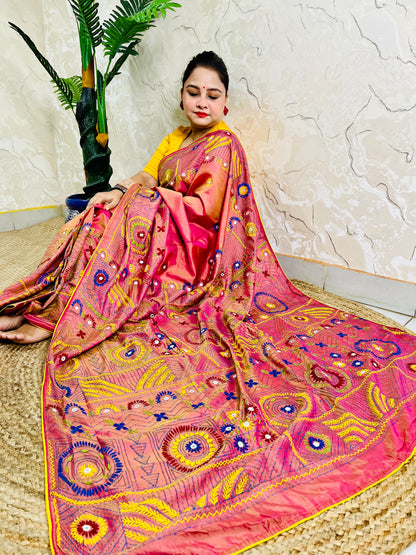 Coral pink Lambani stitch saree with mirror work, full seated drape view
