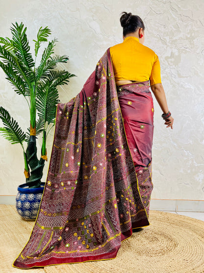Burgundy Lambani embroidered saree with mirror work, back pallu draped view