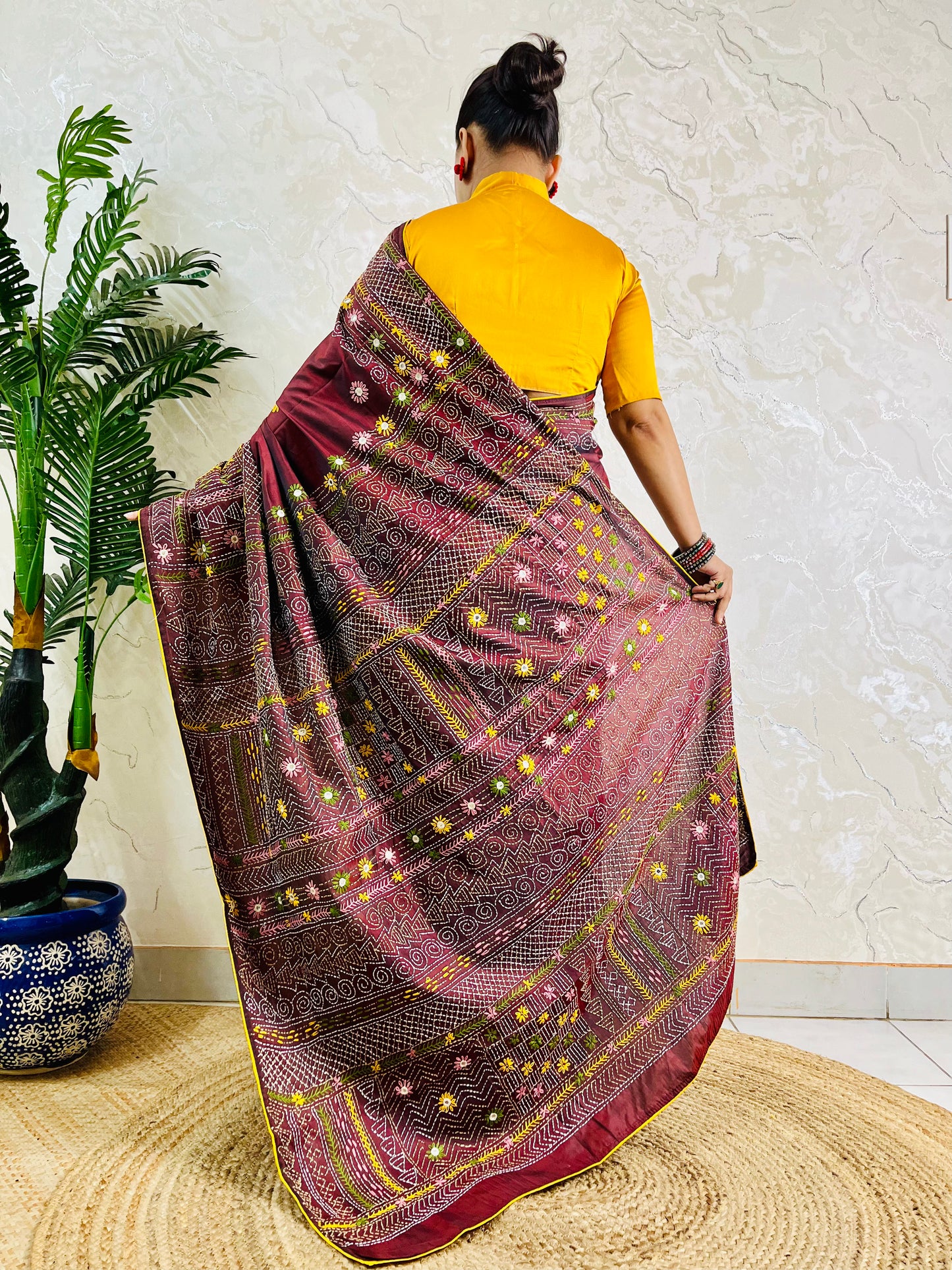 Burgundy Lambani embroidered saree with mirror work, back pallu draped view