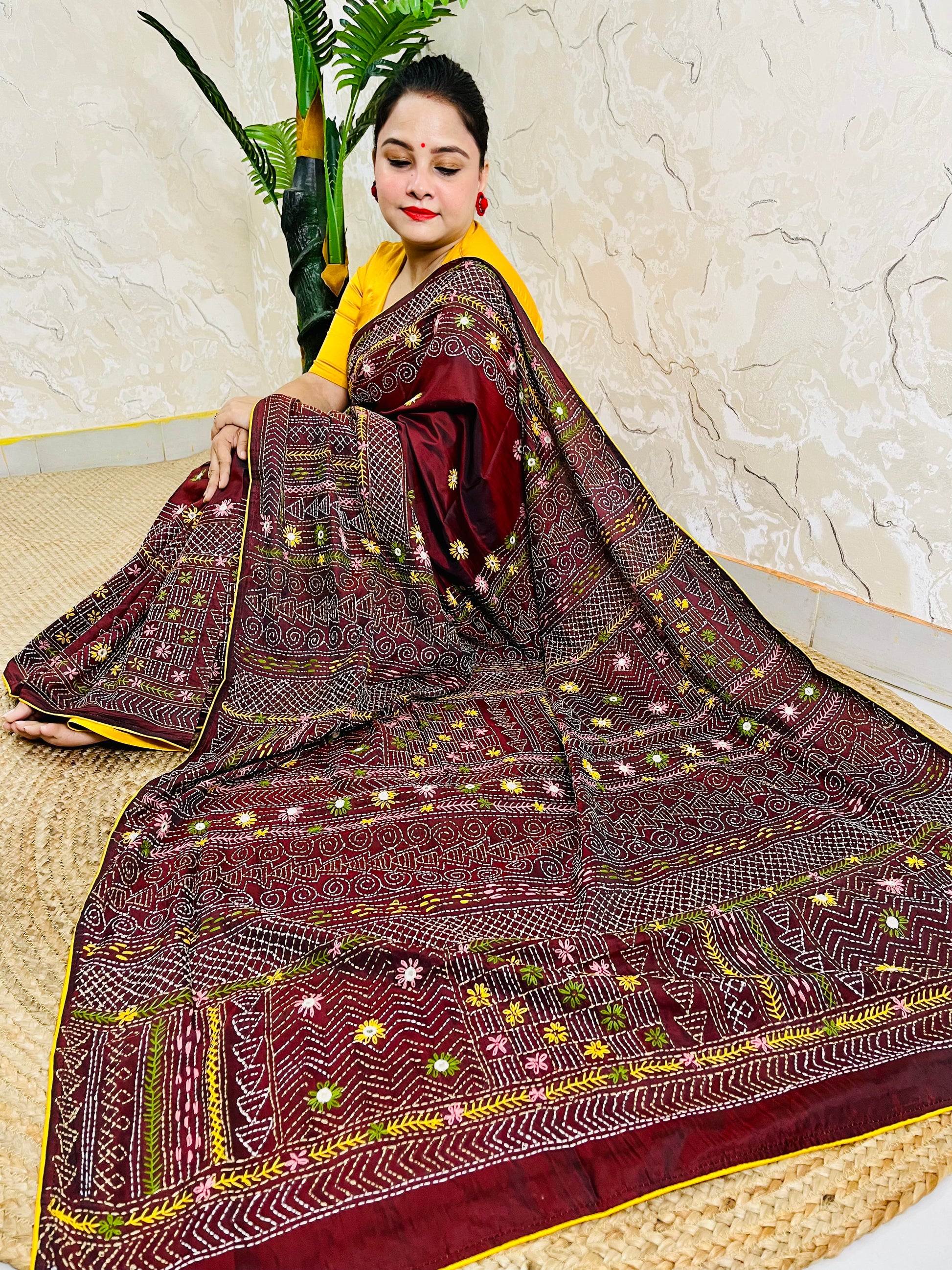 Burgundy Lambani mirror work saree draped, close-up seated view