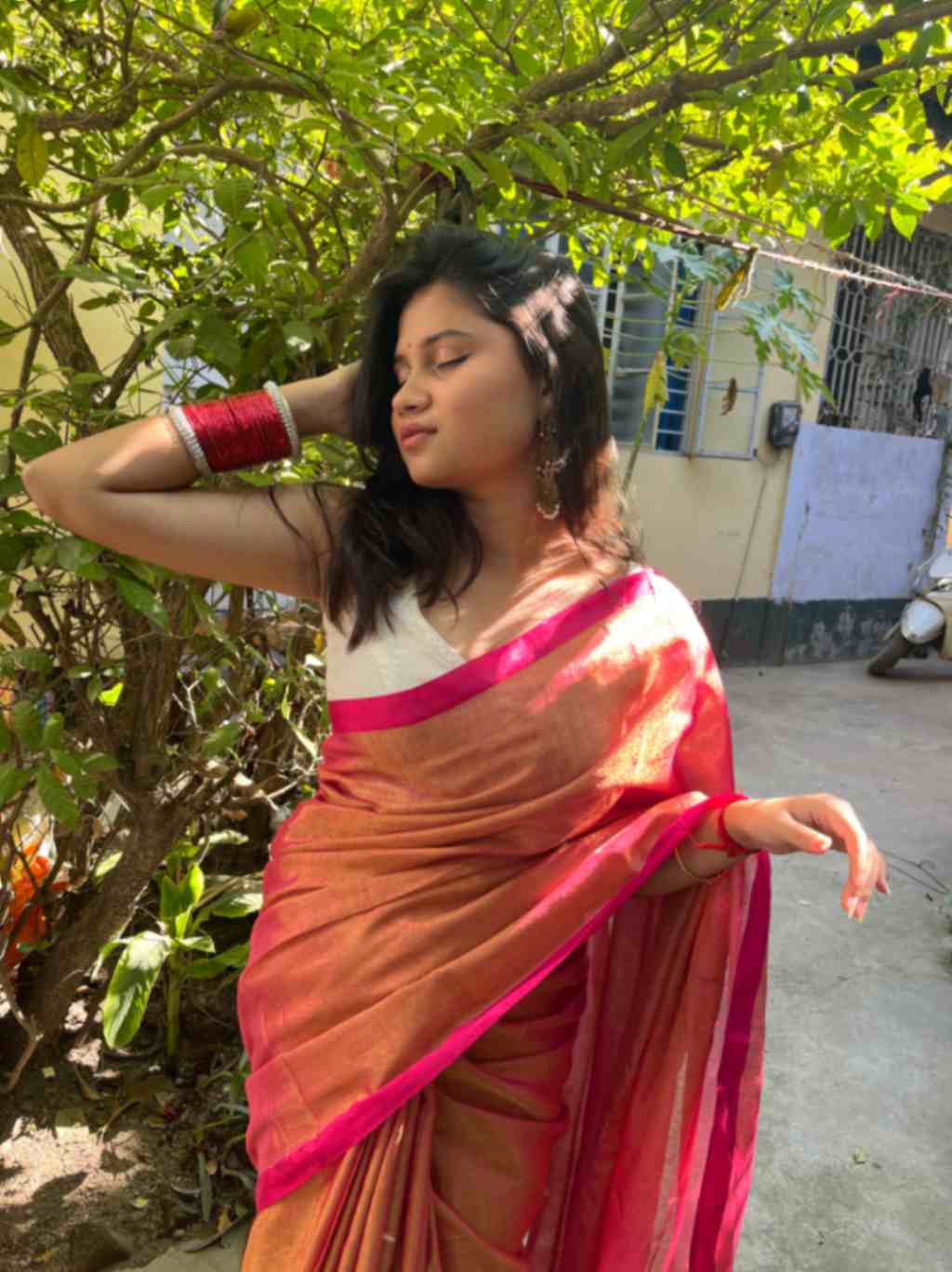 Close-up of Pink Zari Work on Beige Linen Saree