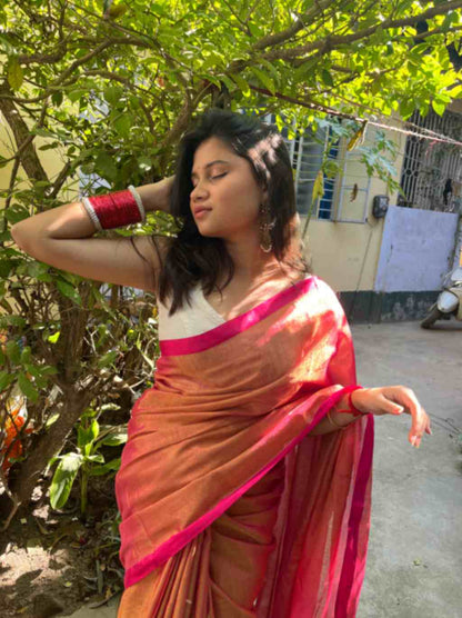 Close-up of Pink Zari Work on Beige Linen Saree