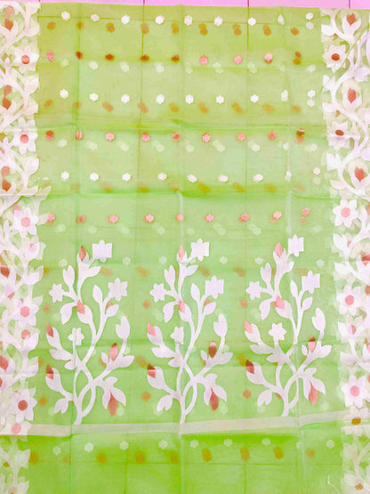 Close-up of Jamdani muslin saree motifs on Banana Leaf Green silk fabric