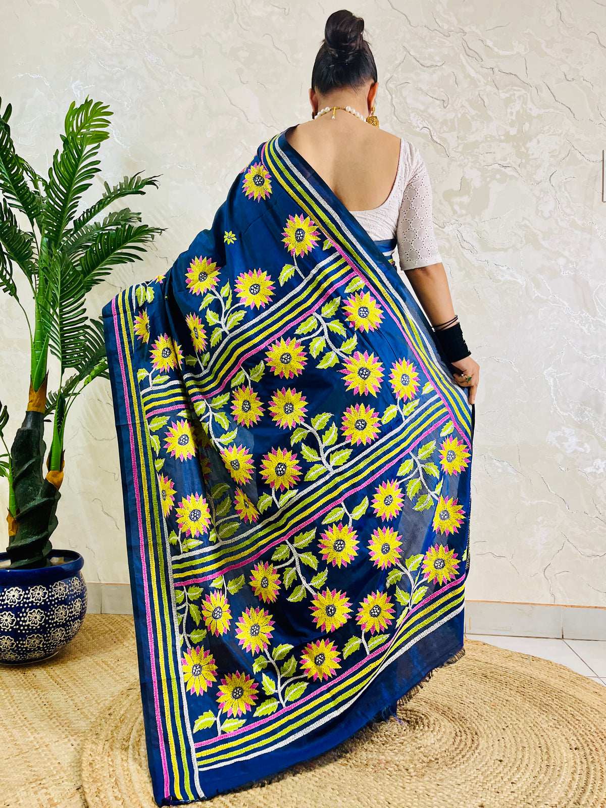Back view of navy blue Bangalore silk saree with sunflower Kantha pallu and striped border