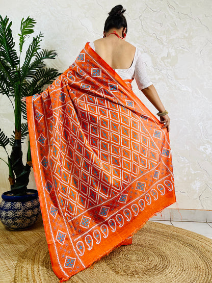 Back view of orange Kutch work saree with paisley pallu on Bangalore silk