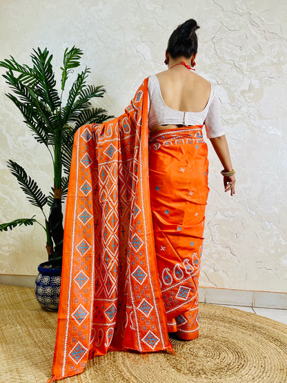 Back view of orange Kutch work saree with paisley pallu on Bangalore silk
