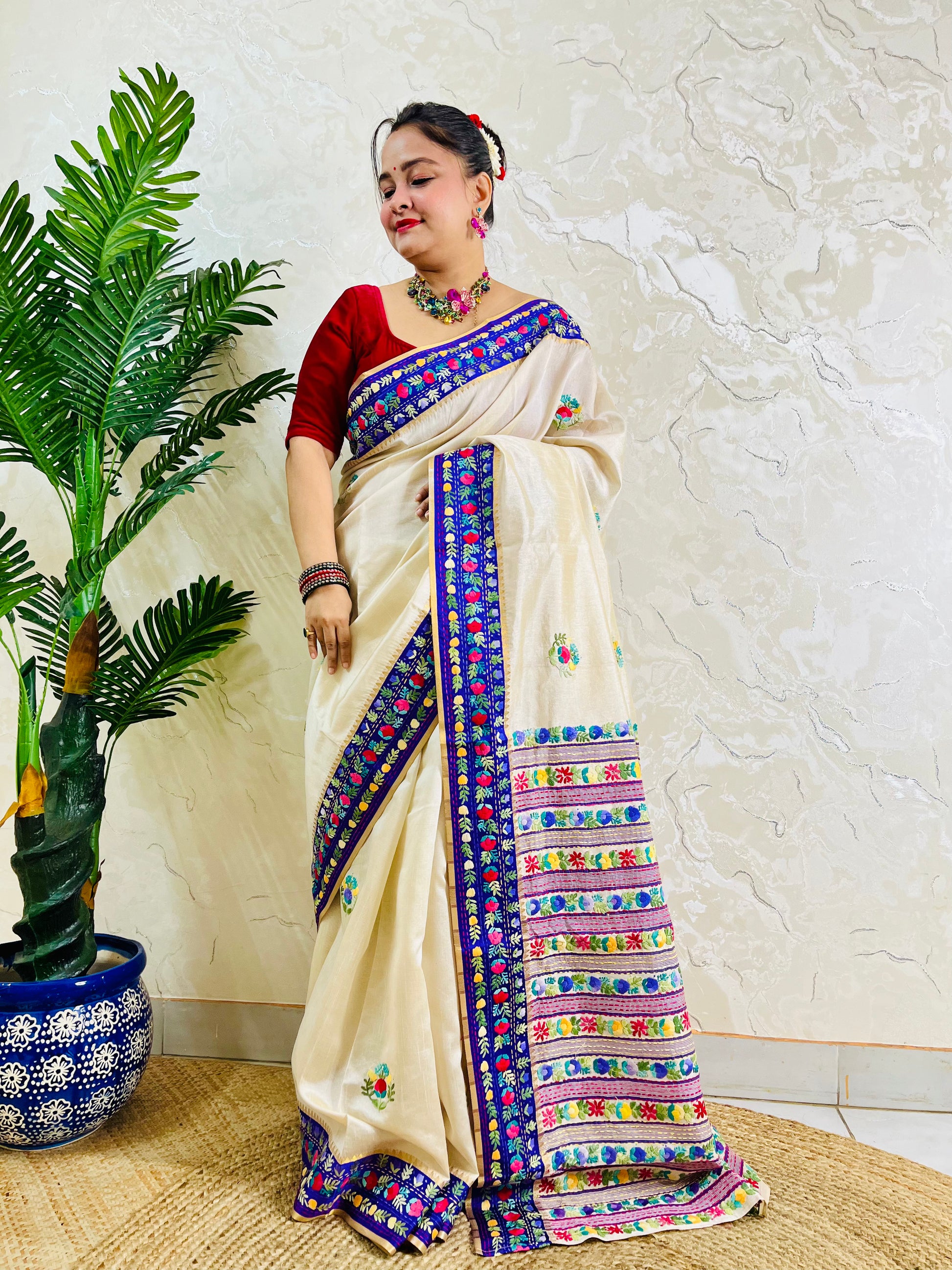 Parsi Gara ivory Semi Muga Silk saree with royal blue velvet border and Kardana work showing full drape — standing bend view, Desi Aadat