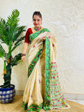 Handwoven Parsi Gara Semi Muga Silk saree with multicolour butti florals and emerald green velvet Kardana embroidered border — standing front view, Desi Aadat