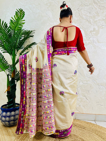 Back view of Parsi Gara handwoven ivory Semi Muga Silk saree with magenta pink velvet border and multicolour Gara floral pallu in motion — Desi Aadat