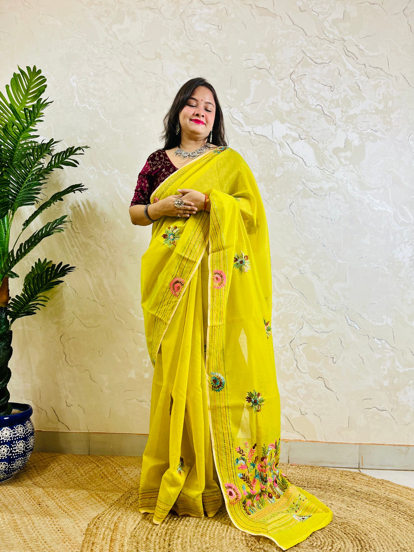 Lemon yellow Parsi Gara handwork Chanderi silk cotton saree with scattered butti florals and multicolour garden border — standing front view, Desi Aadat