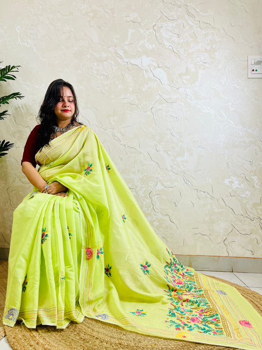 Parsi Gara handmade pastel lime Chanderi silk cotton saree with Persian heritage floral and medallion embroidery — front sitting view, Desi Aadat
