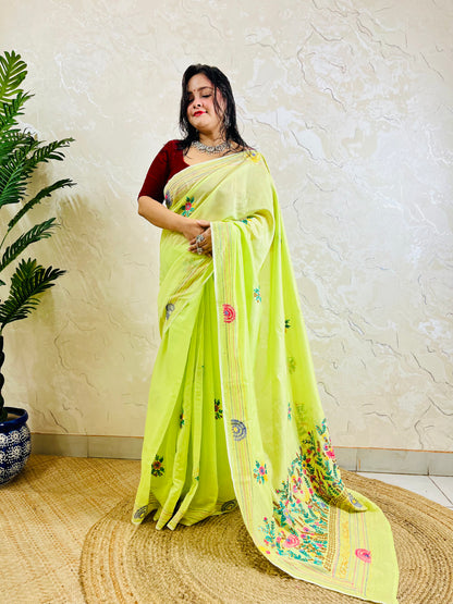 Pastel lime Parsi Gara handwork Chanderi silk cotton saree with dense multicolour floral border — standing front view, Desi Aadat