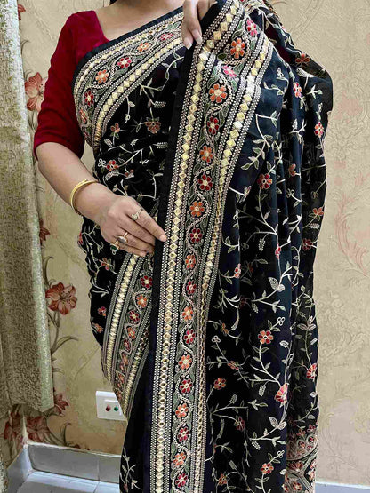 Close-up of Pashmina embroidery on Black georgette saree fabric