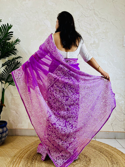 Lucknowi Chikankari handstitched pastel purple organza silk saree with tone-on-tone floral embroidery — standing left view, Desi Aadat
