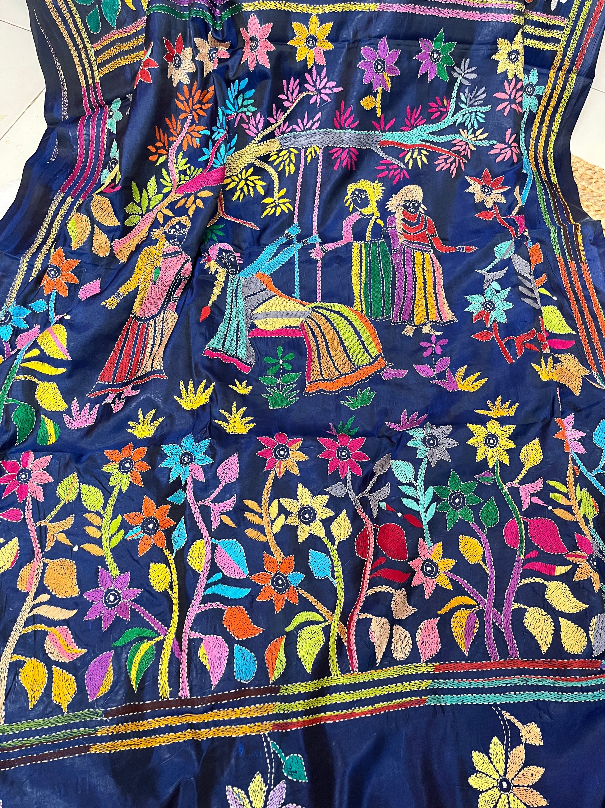 Detailed texture of silk blend with raised Kantha stitch embroidery work