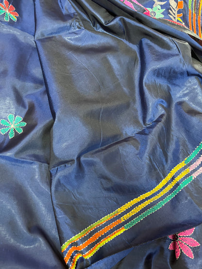 Matching peacock blue blouse piece with coordinating human and floral Kantha details