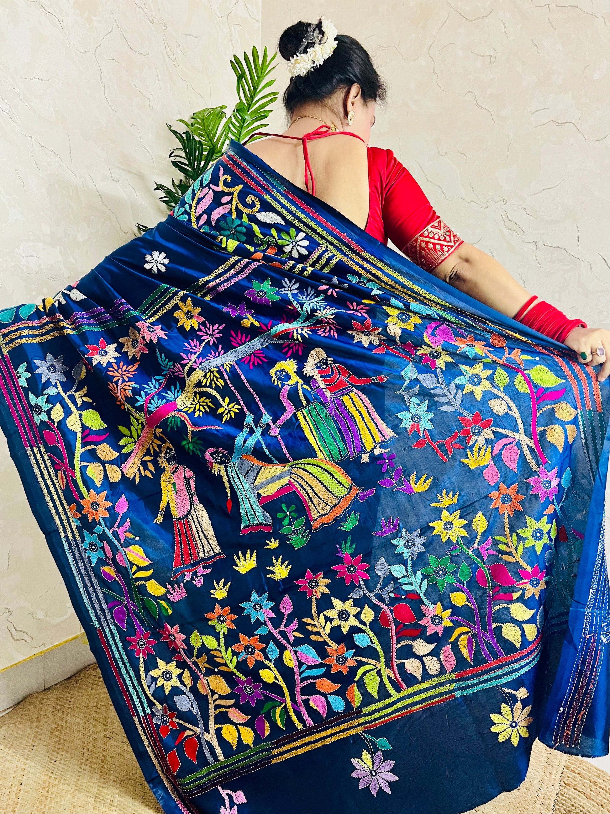 Detailed texture of silk blend with raised Kantha stitch embroidery work