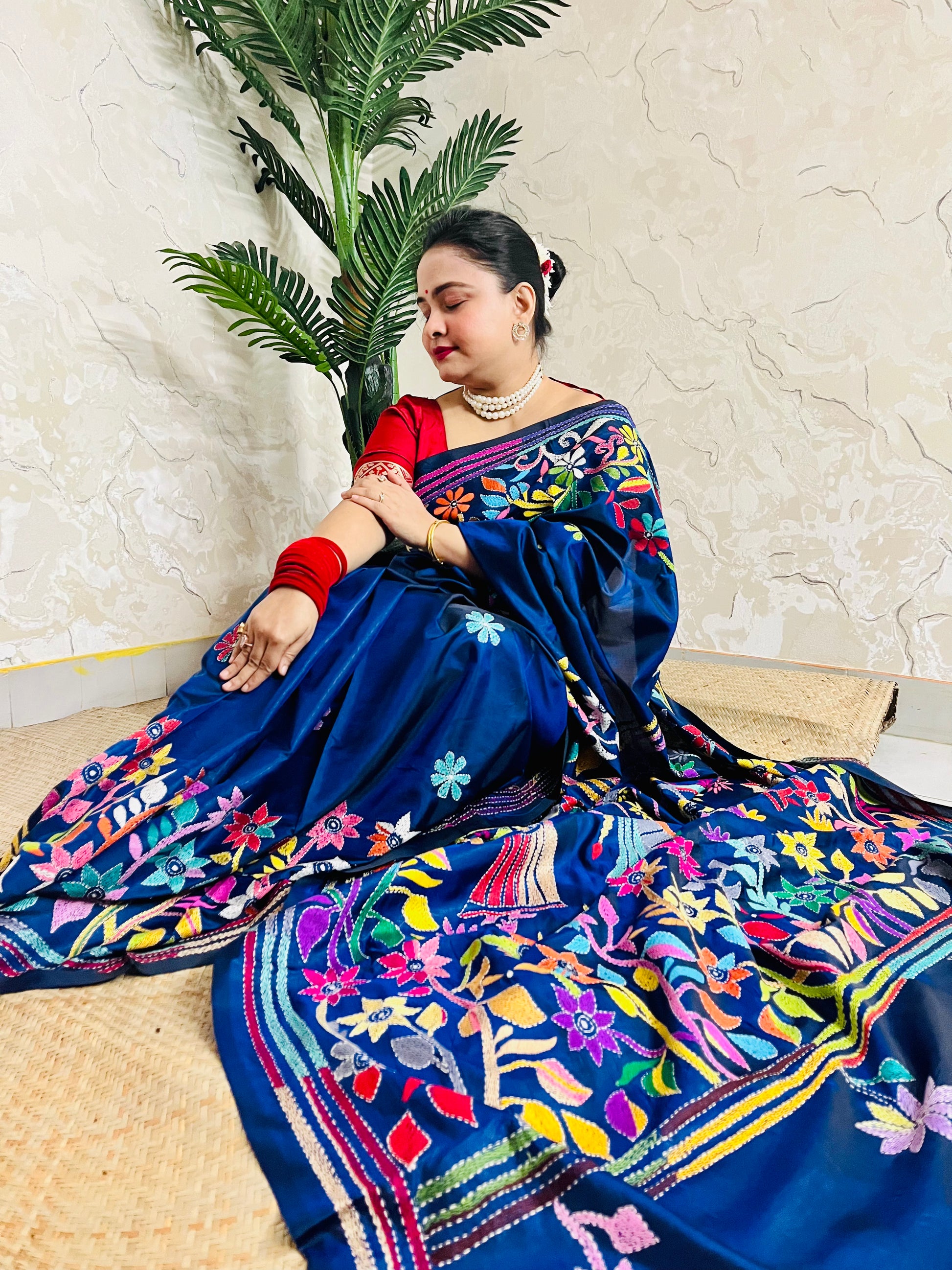 Detailed texture of silk blend with raised Kantha stitch embroidery work