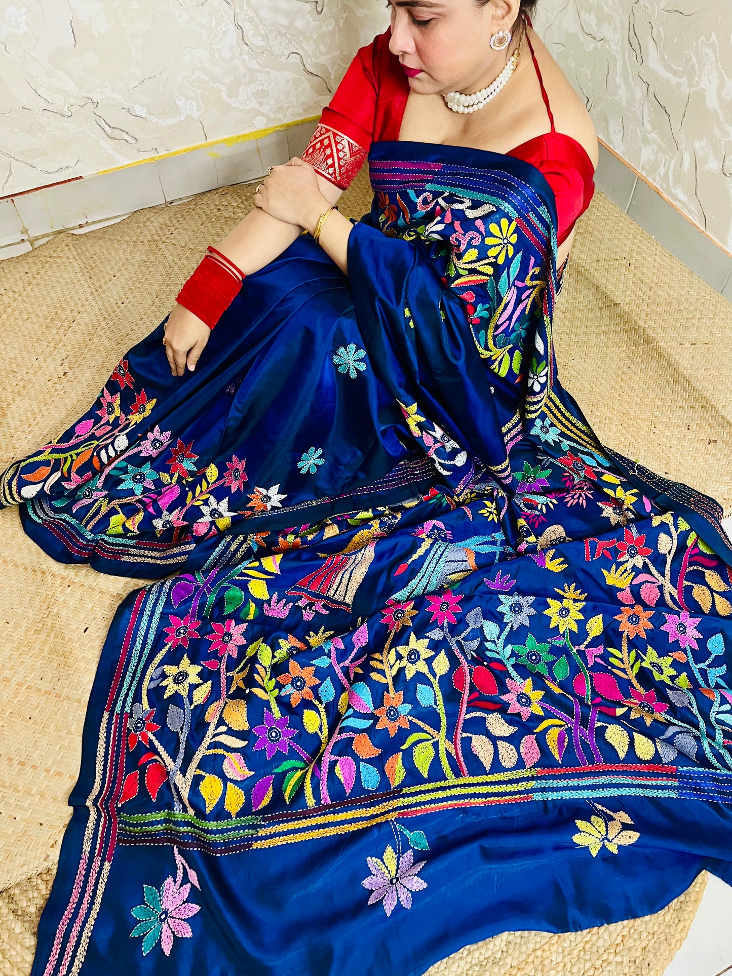 Detailed texture of silk blend with raised Kantha stitch embroidery work