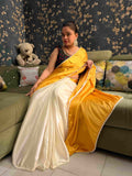 Handwoven Golden Yellow Pearl Satin Silk Saree with intricate craftsmanship by Desi Aadat