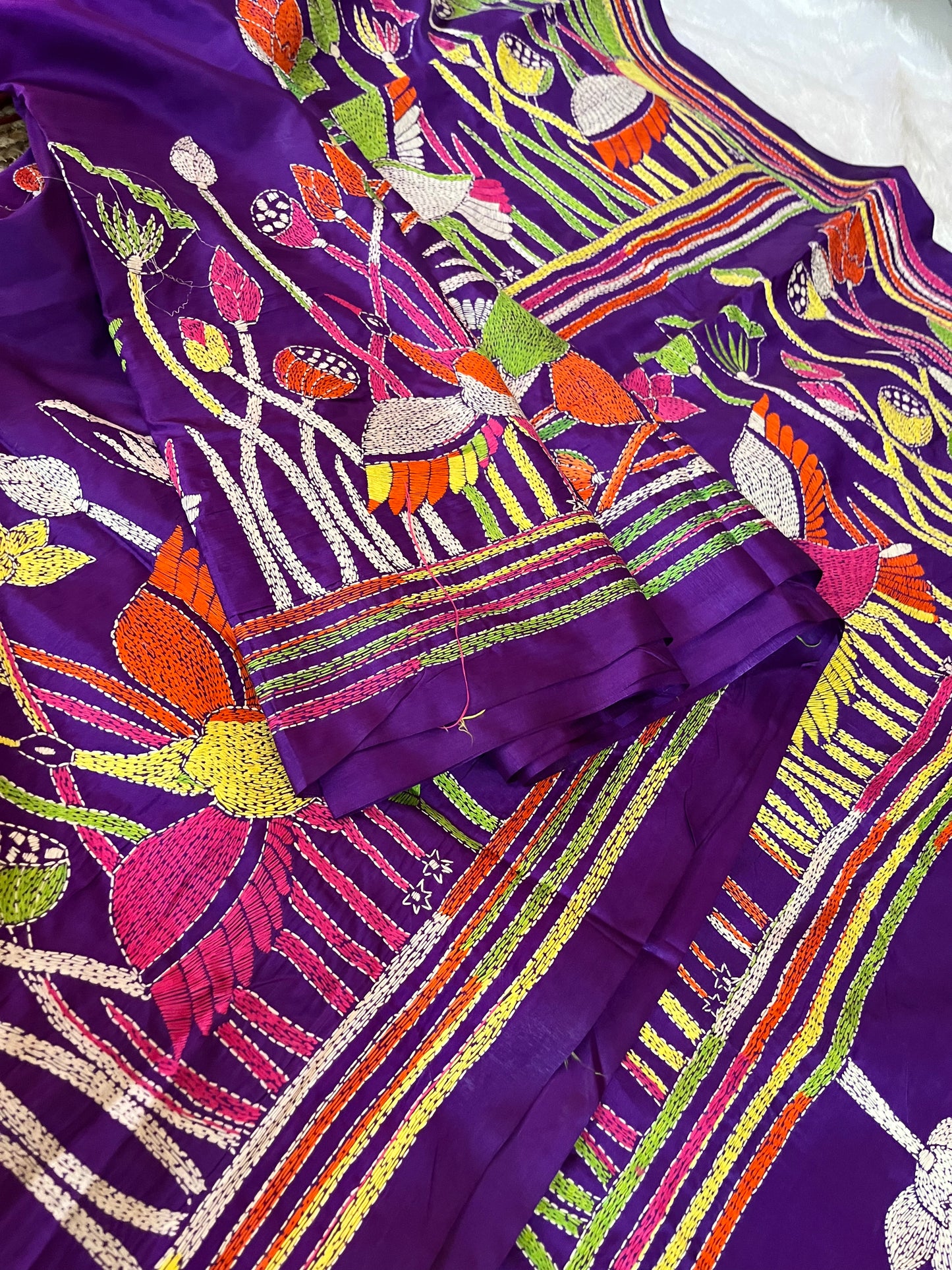 Matching purple blouse piece with coordinating bird and floral Kantha work