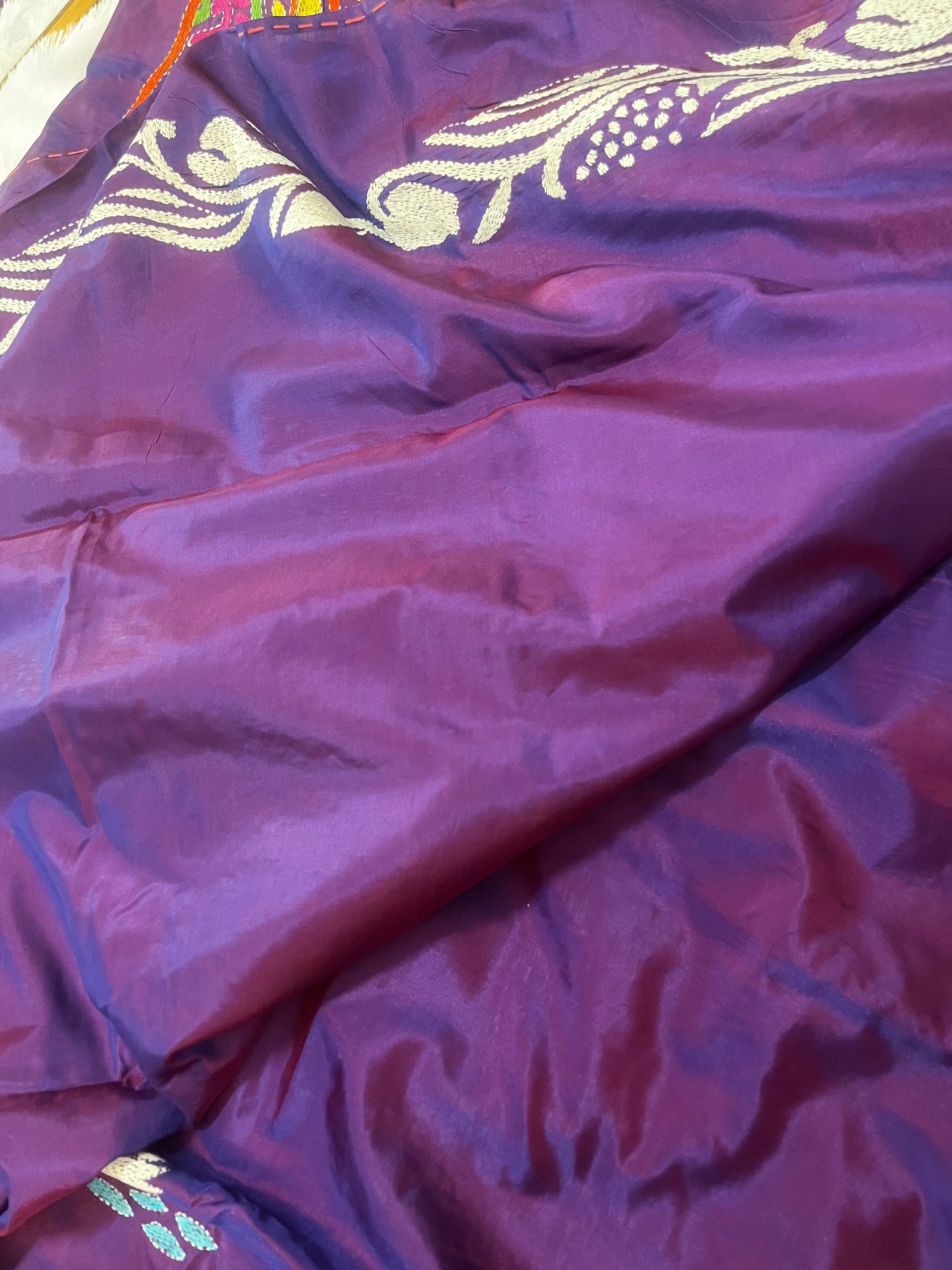 Matching purple blouse piece with coordinating golden swarn Kantha details