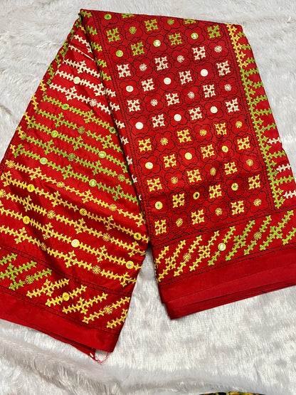 Red Gujarati Stitch Saree with green yellow white Kutch hand embroidery and mirror work by Desi Aadat