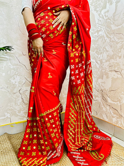 Red Gujarati Stitch Saree with green yellow white Kutch hand embroidery and mirror work by Desi Aadat