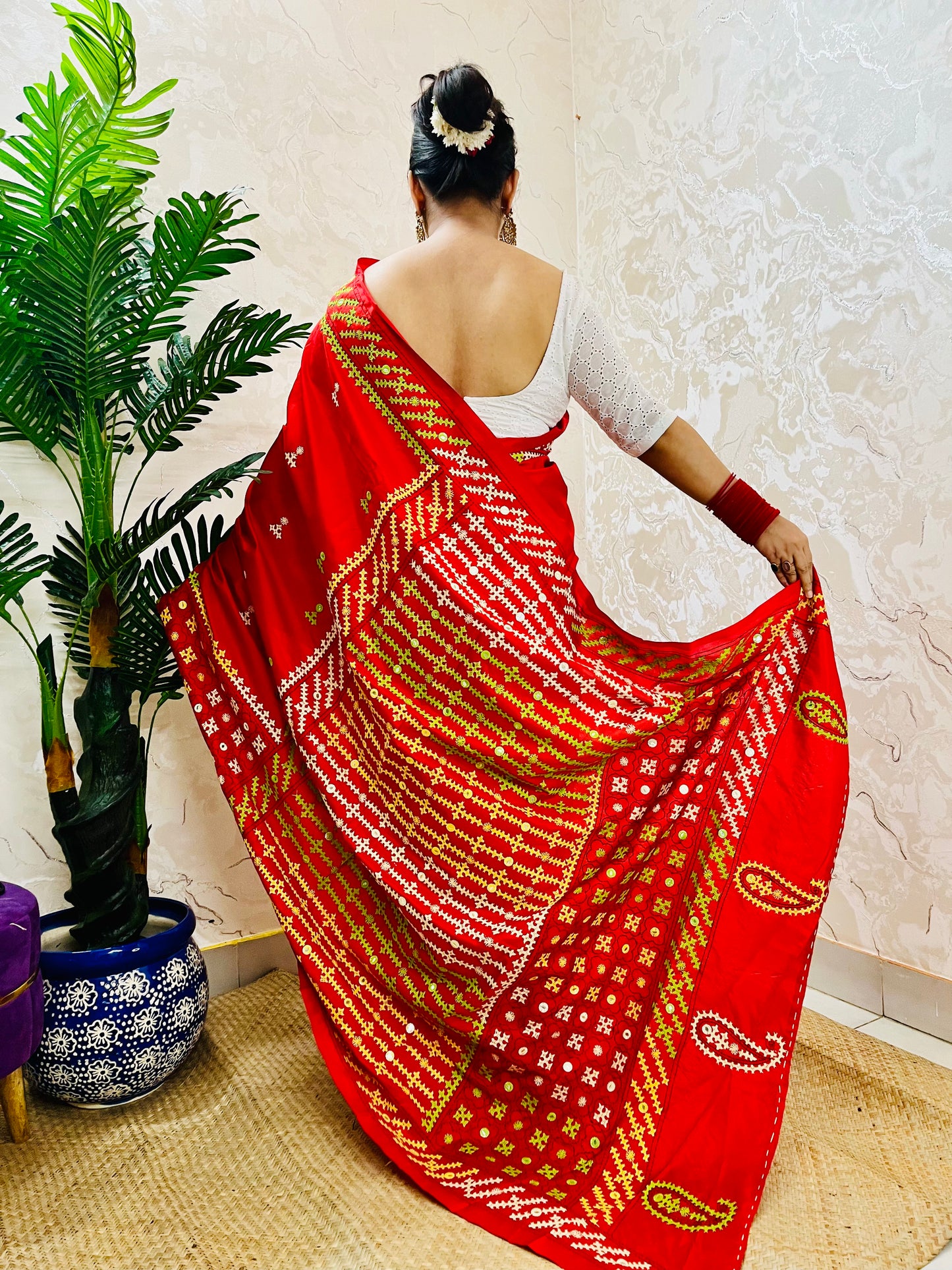Red Gujarati Stitch Saree with green yellow white Kutch hand embroidery and mirror work by Desi Aadat