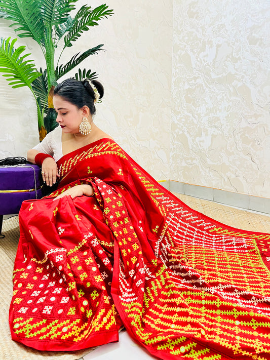 Red Gujarati Stitch Saree with green yellow white Kutch hand embroidery and mirror work by Desi Aadat