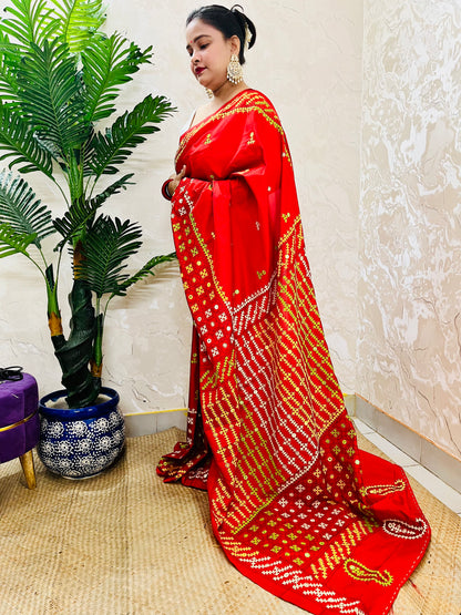 Red Gujarati Stitch Saree with green yellow white Kutch hand embroidery and mirror work by Desi Aadat