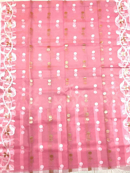 Graceful woman in Peach Pink handwoven saree showcasing Desi Aadat’s Jamdani artistry