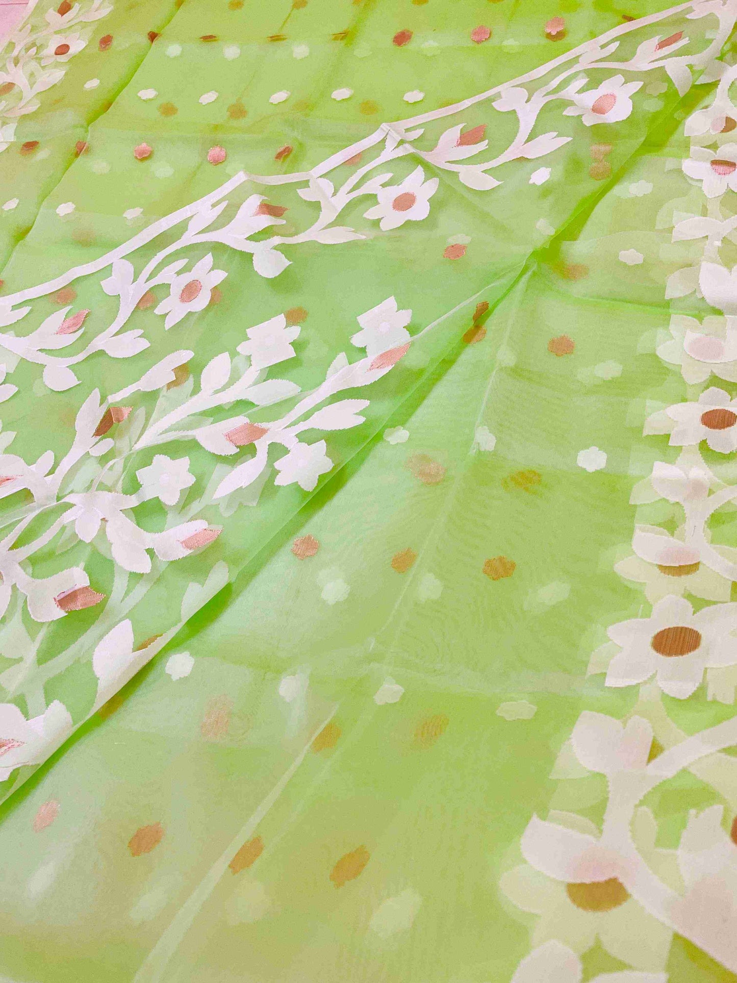 Vibrant woman in Banana Leaf Green handwoven saree showcasing Desi Aadat’s Jamdani design