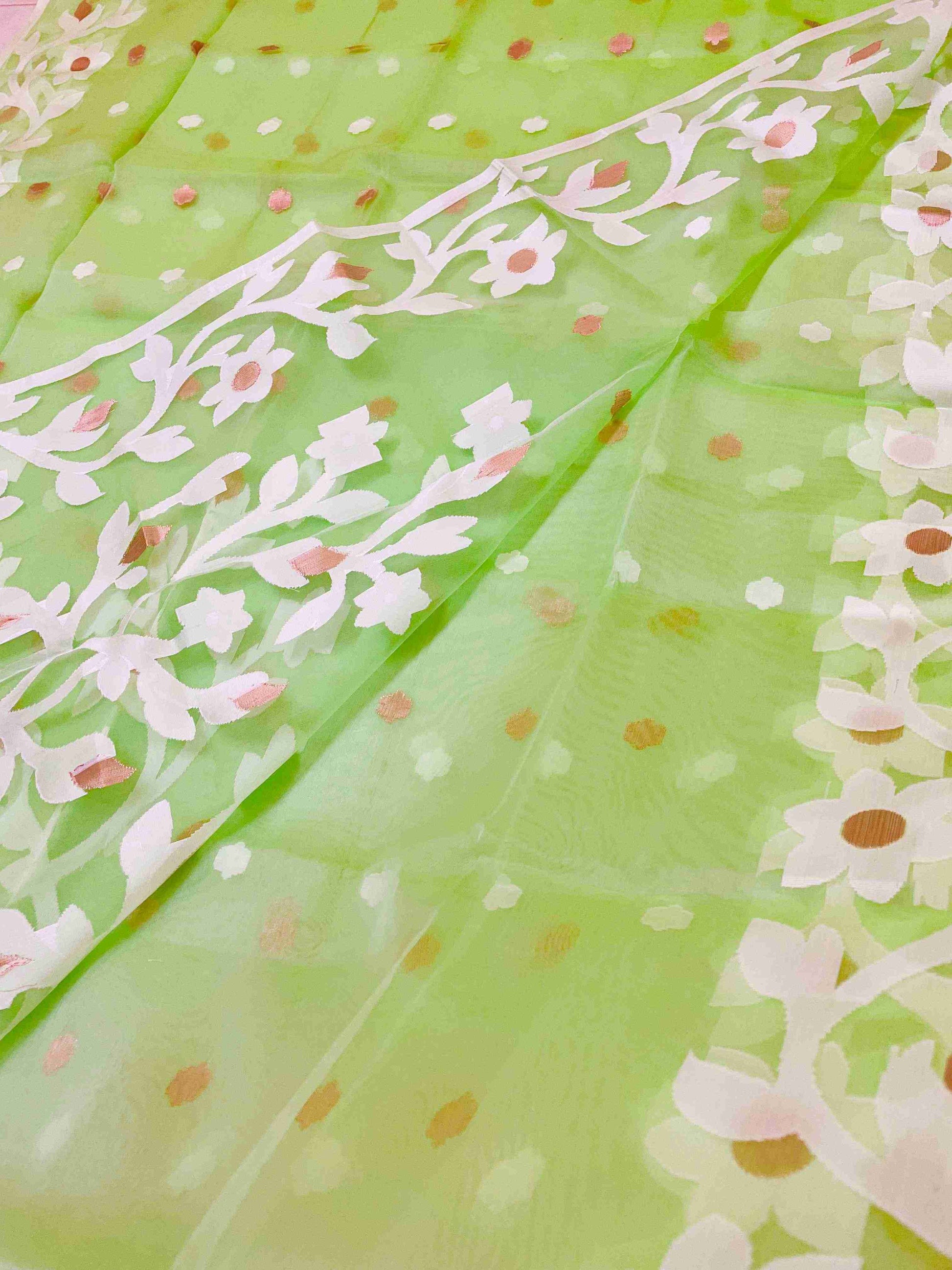 Vibrant woman in Banana Leaf Green handwoven saree showcasing Desi Aadat’s Jamdani design