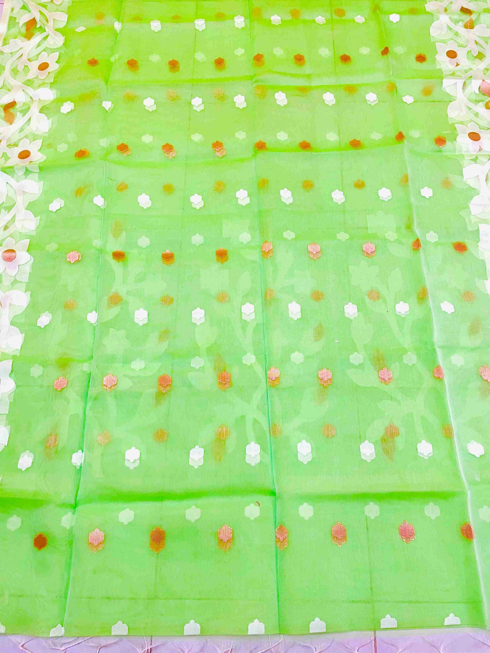 Vibrant woman in Banana Leaf Green handwoven saree showcasing Desi Aadat’s Jamdani design