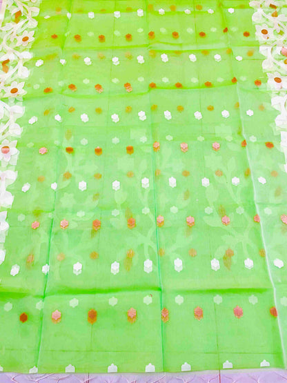 Vibrant woman in Banana Leaf Green handwoven saree showcasing Desi Aadat’s Jamdani design