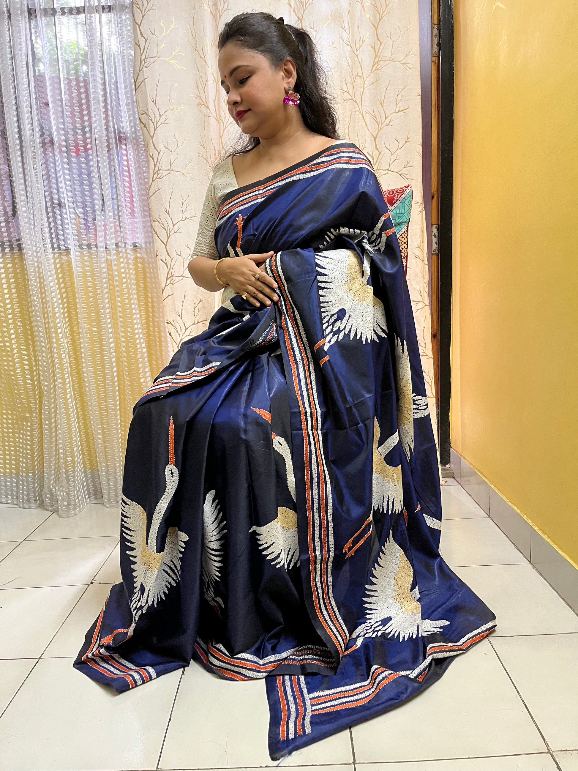 Soft drape and texture of handwoven kantha stitch silk saree fabric