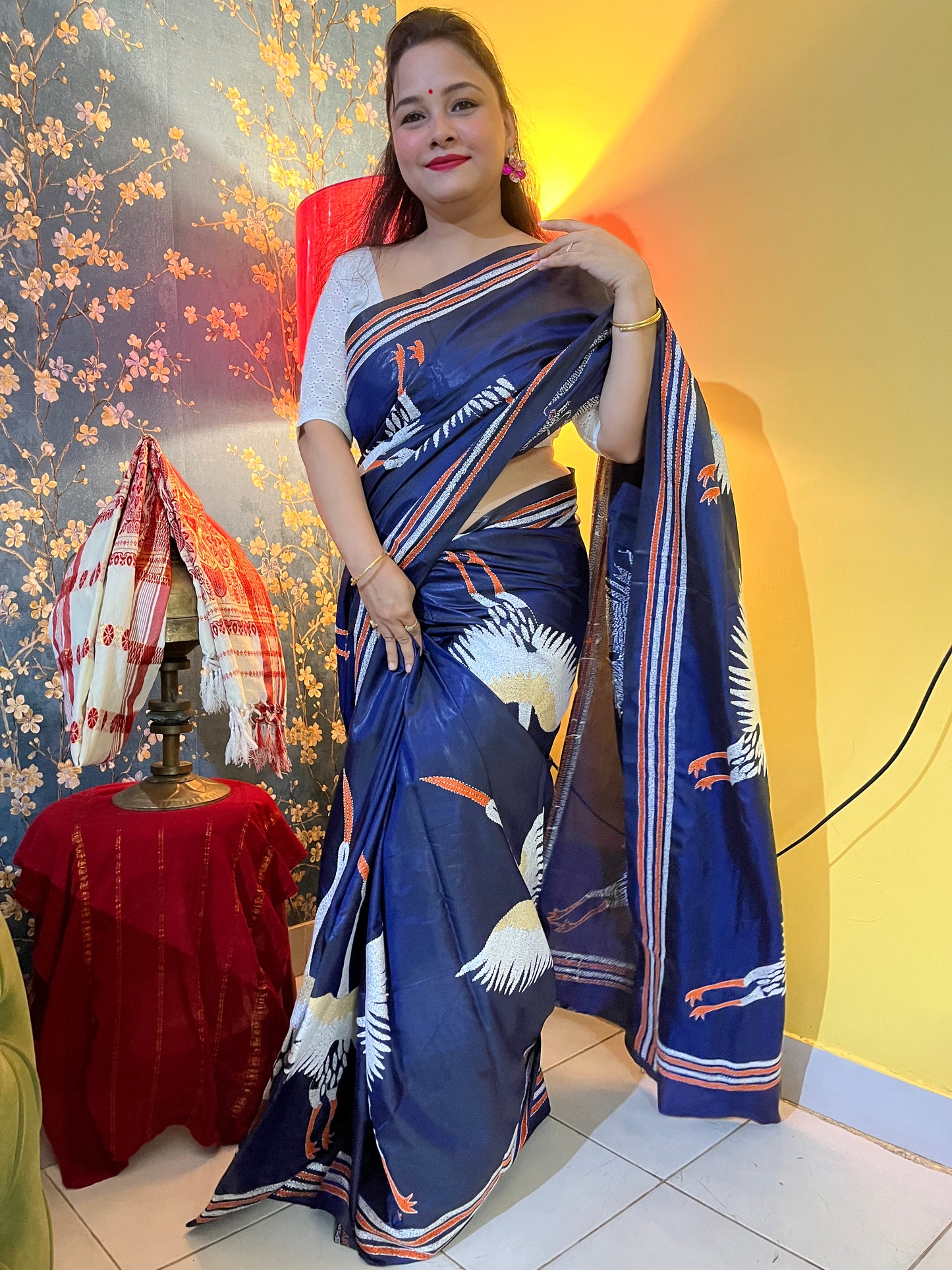 Model showcasing royal blue kantha stitch saree in festive styling