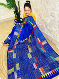 Sitting view of royal blue Kantha saree showing pennant flag pallu detail