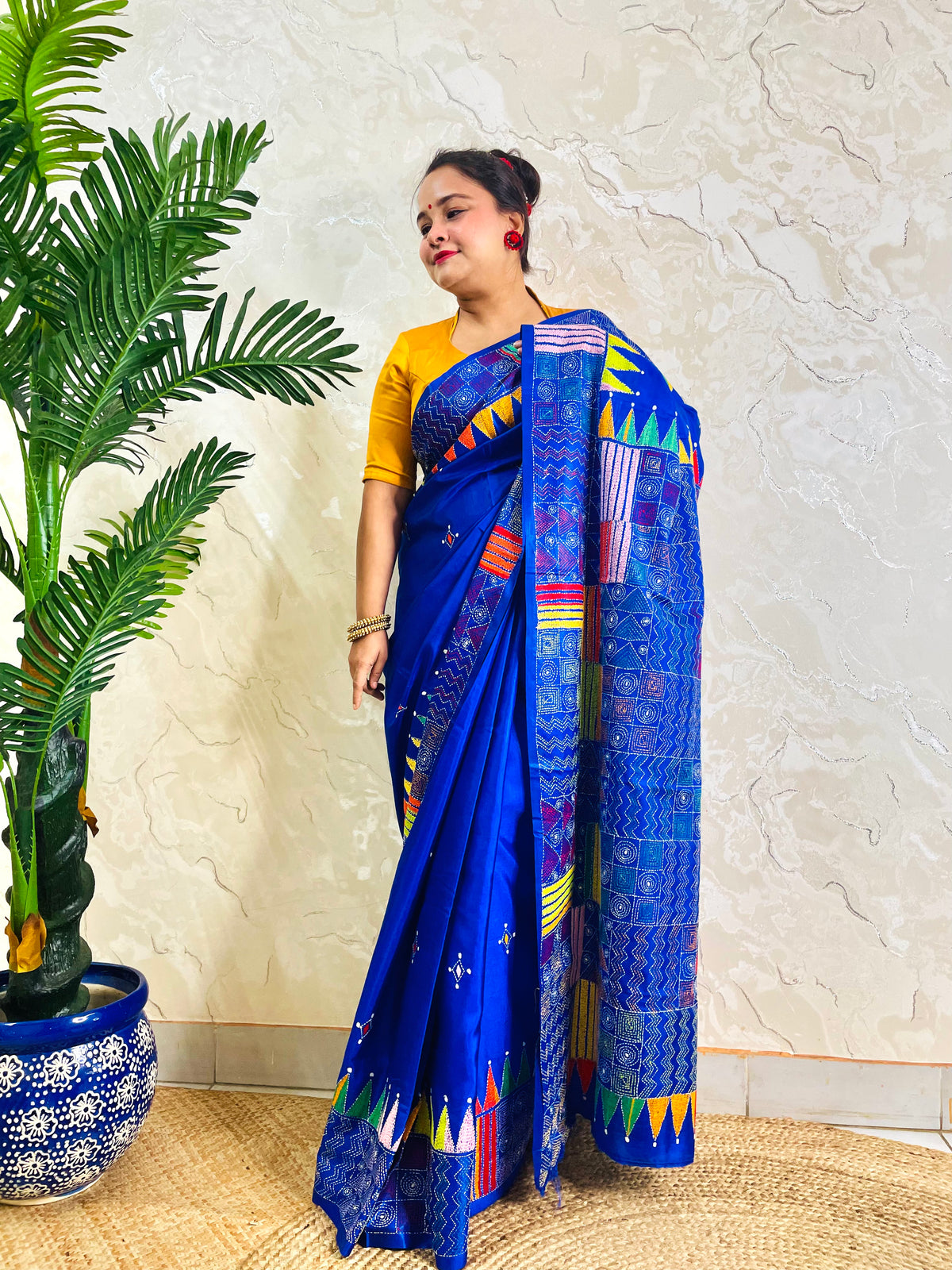 Royal blue Kantha stitch saree with geometric pattern, front standing view